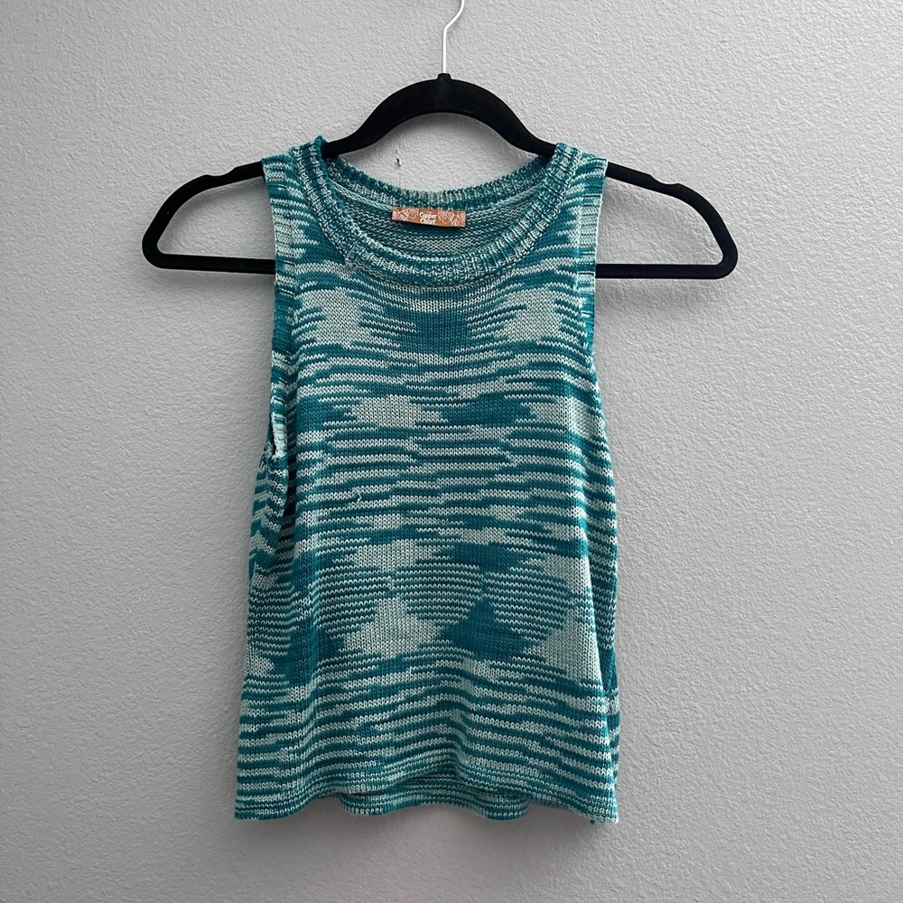 green knit top